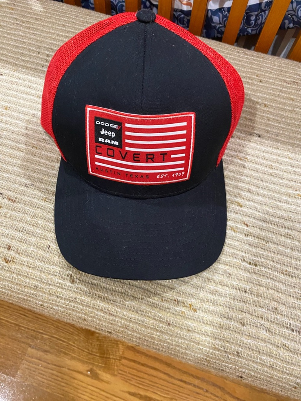 Pacifica Black and Red Mesh Trucker Hat with Covert Patch